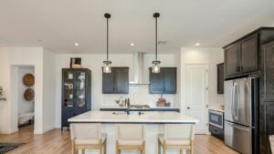 pendant lights over a kitchen island installed by licensed electrician.