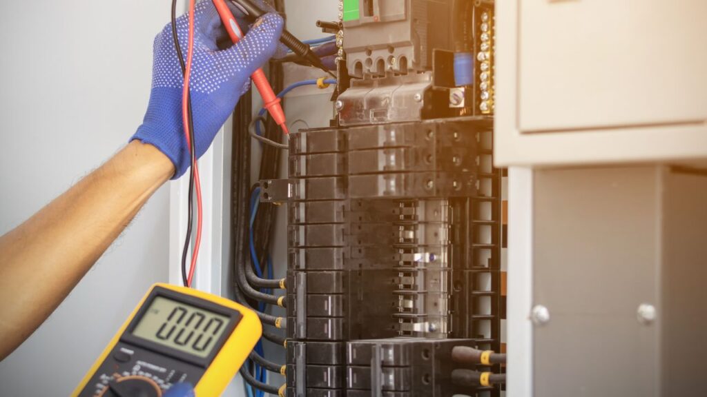 electrician inspection a home electric panel.