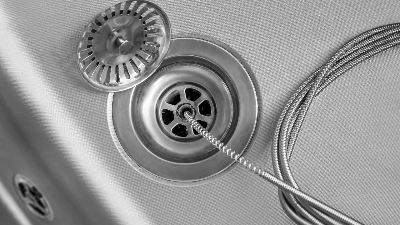 drain snake in kitchen sink